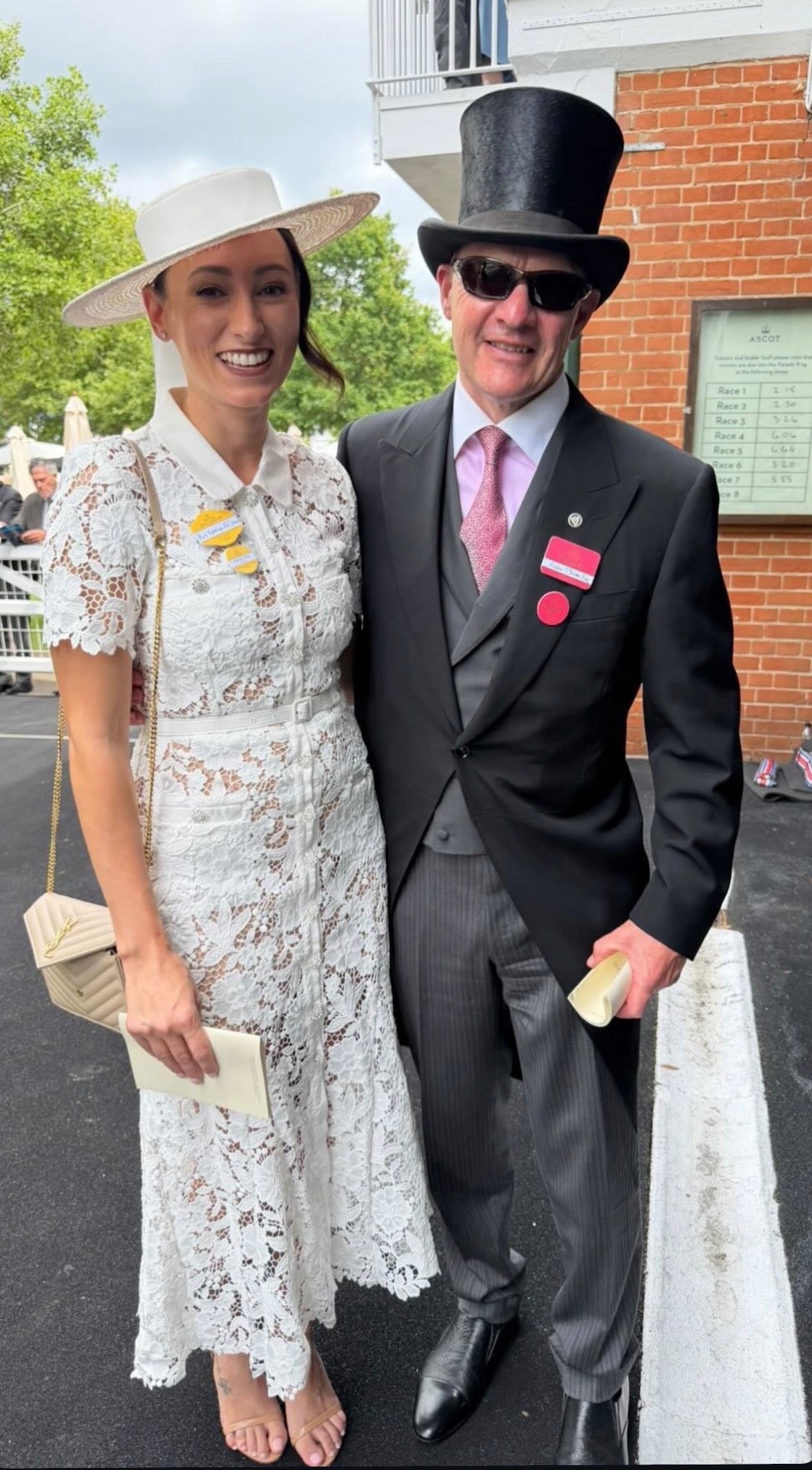 Katelyn McDonald wearing a white straw boater hat, Royal Ascot racewear.