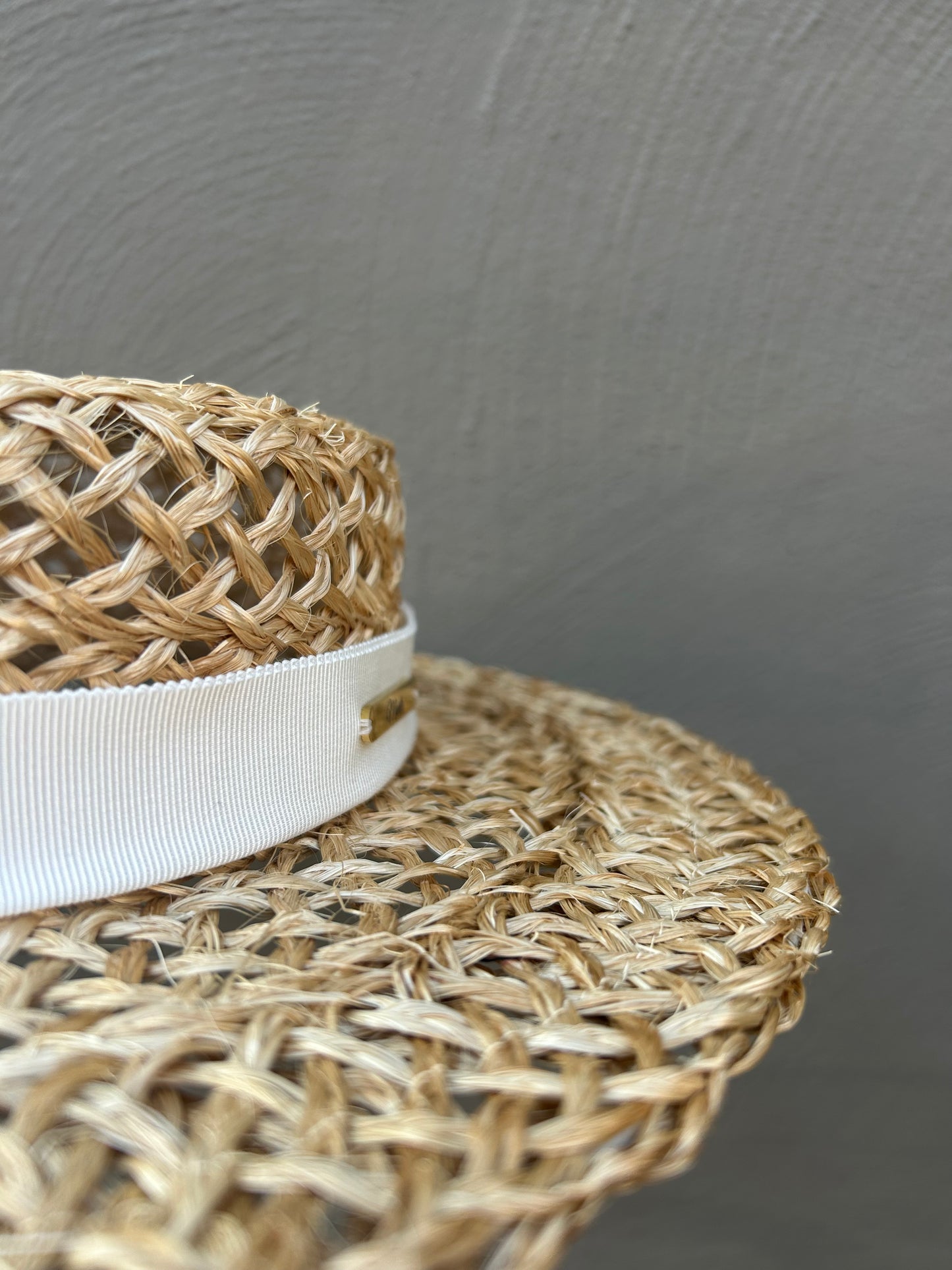 straw hat with white hatband