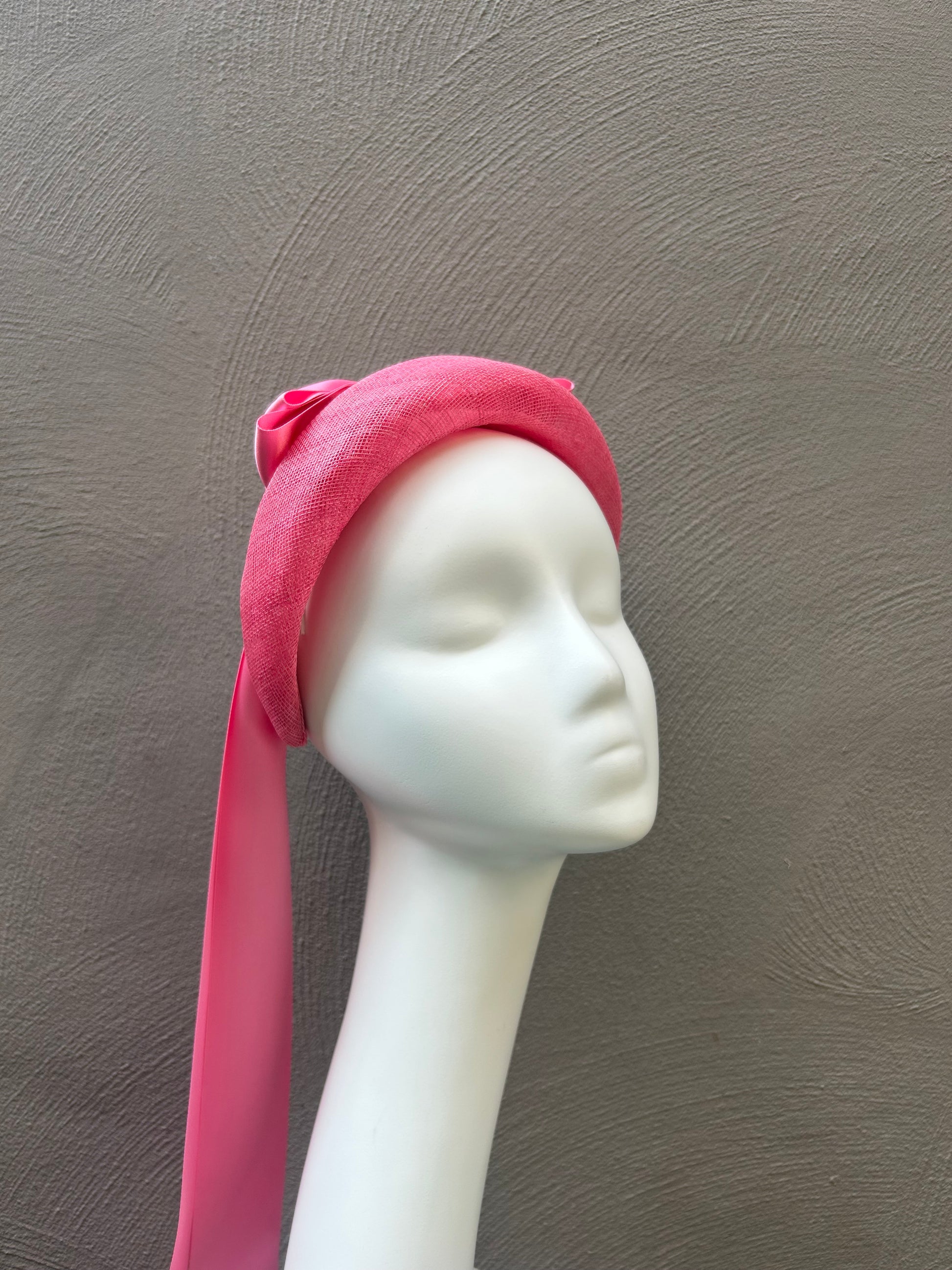 pink headband with pink ribbon bows