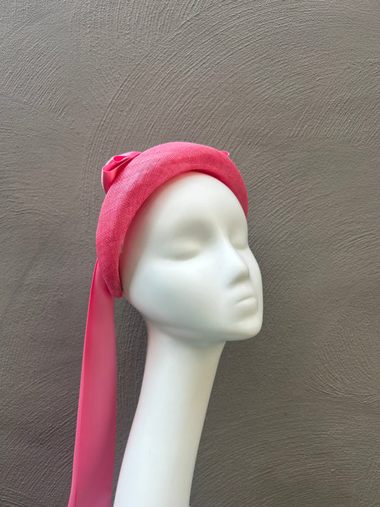 pink headband with pink ribbon bows