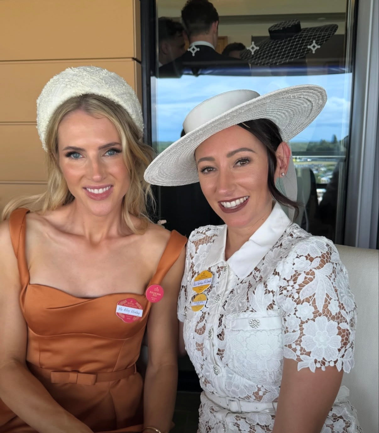 Katelyn McDonald wearing a white straw boater hat, Royal Ascot racewear.
