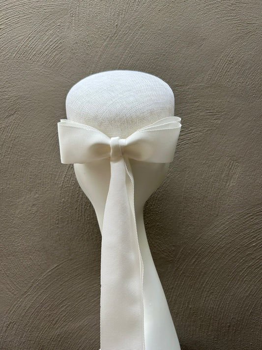 White hat with double bow