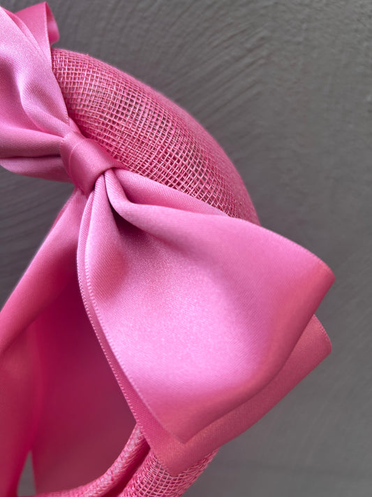 pink headband with pink ribbon bows