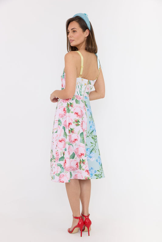 floral dress and blue headpiece