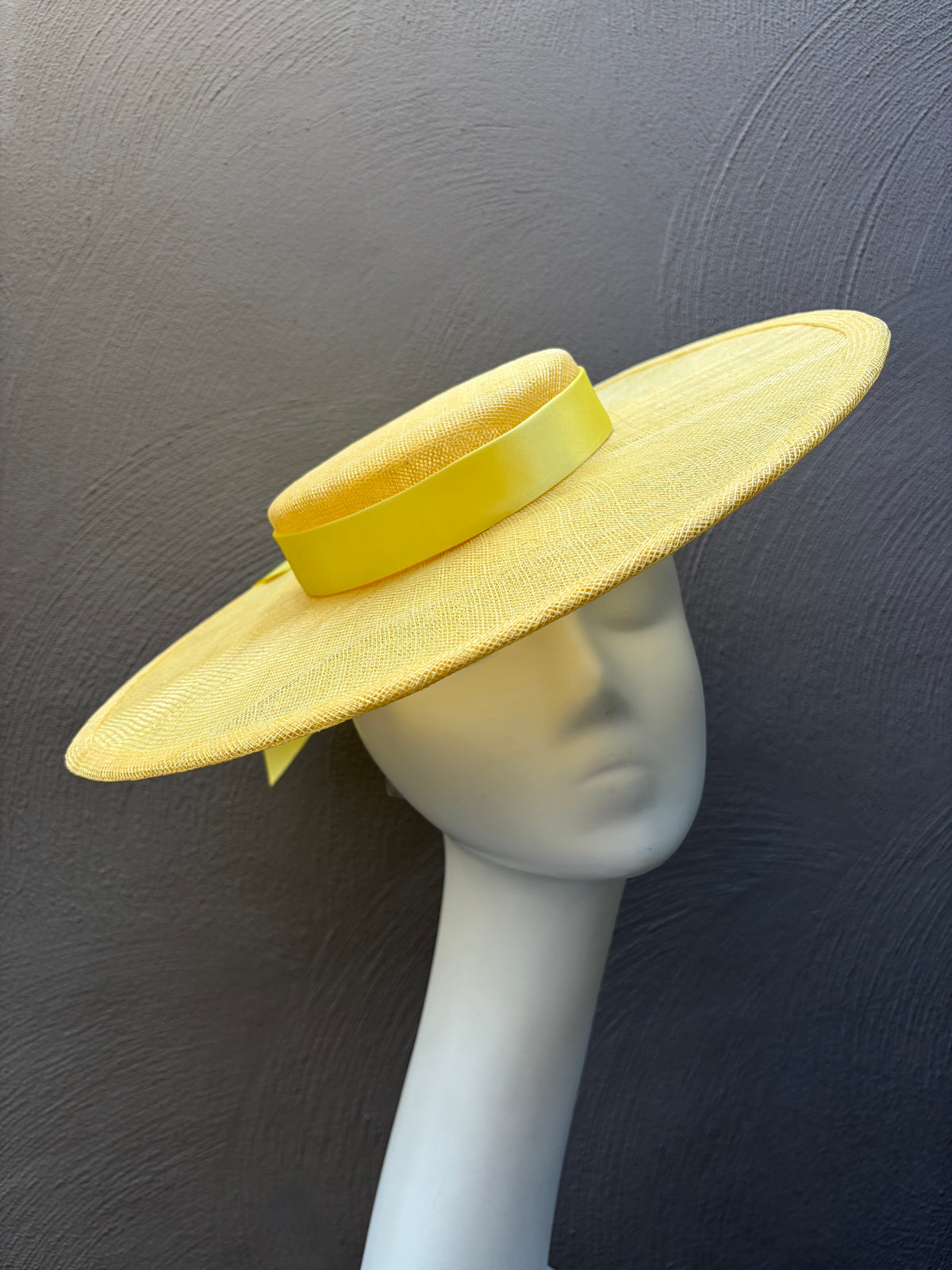 Handcrafted ribbon boater in two shades of lemon yellow. A fresh and elegant statement hat for race days, garden parties and special occasions. 🍋