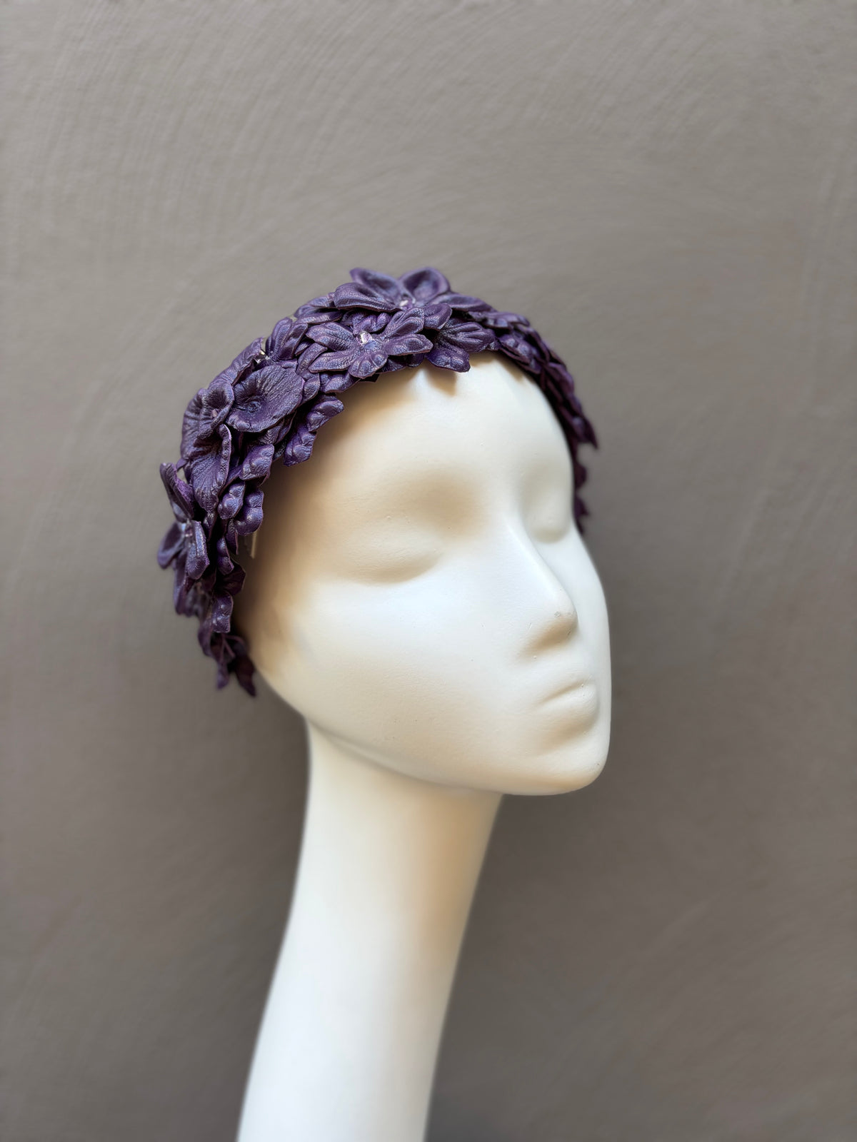 Purple leather meadow headpiece with handcrafted floral detailing