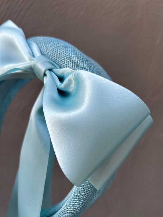 Blue headpiece with satin bows