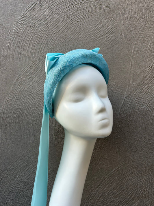 Blue headpiece with satin bows