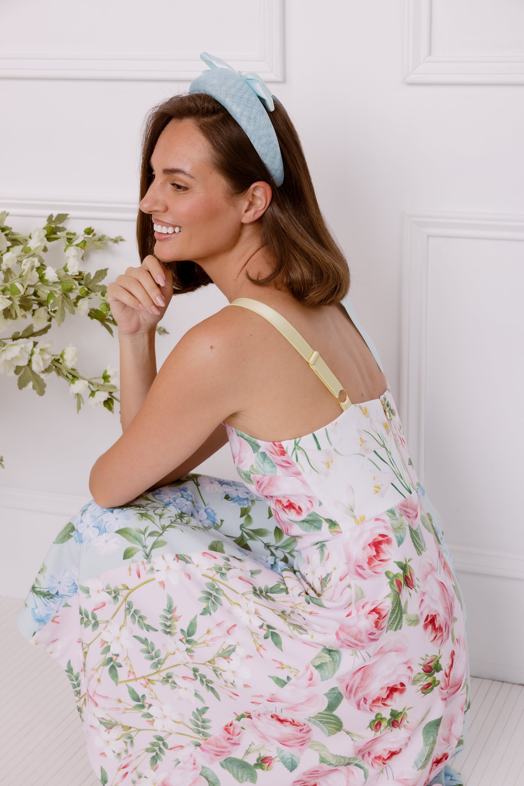 Pastel botanical print dress with light blue millinery
